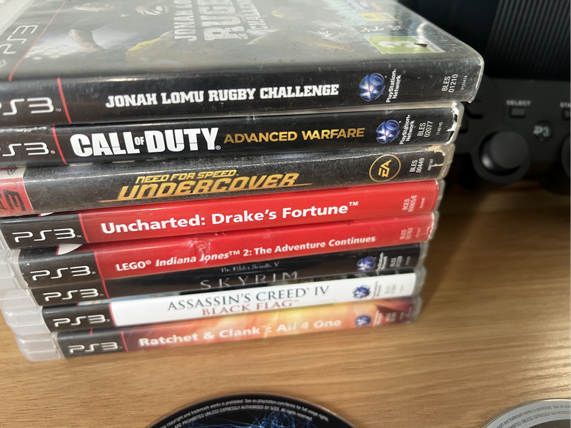 PlayStation 3 (PS3) Super Slim 500GB  Game Bundle Includes 16 Titles