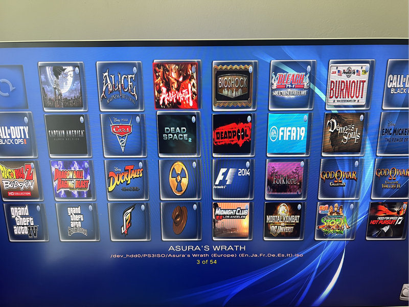 PS3 Super Slim Limited Edition (Red) loaded with 50games