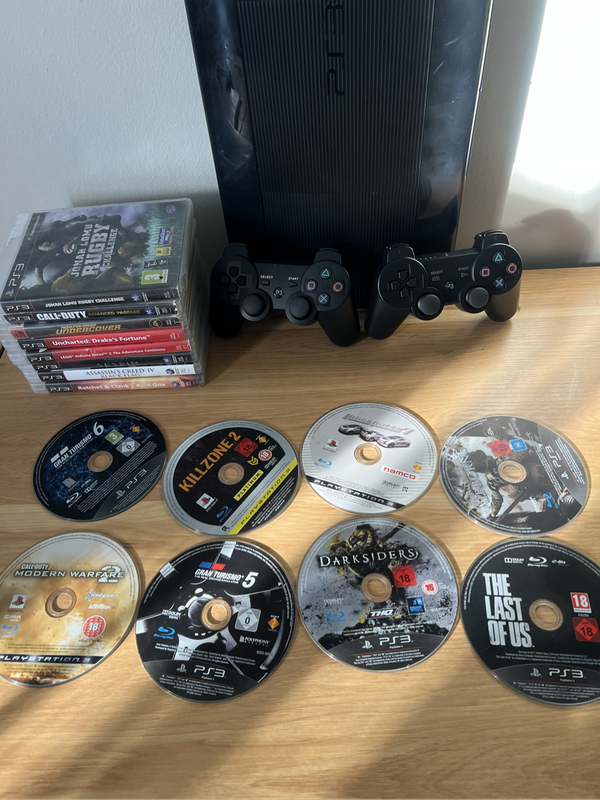 PlayStation 3 (PS3) Super Slim 500GB  Game Bundle Includes 16 Titles