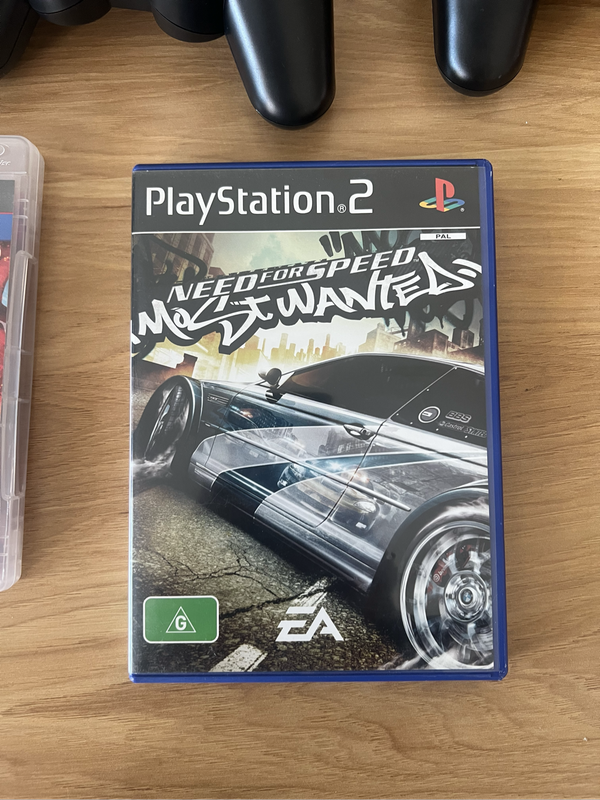 PlayStation 3 First Edition (Backwards Compatible)  Bundle | Includes 2 PS3 Games + 1 PS2 Game + 2