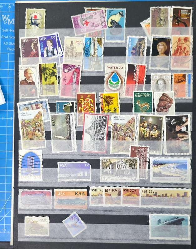 Stock Book: 8/16 containing Used World Mix Stamps - Finds Possible