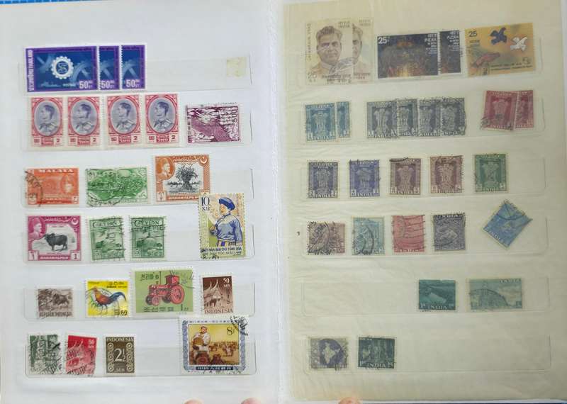 Stock Book: 10 Page/ 20 Sides White with Used World Mix (See Scans)