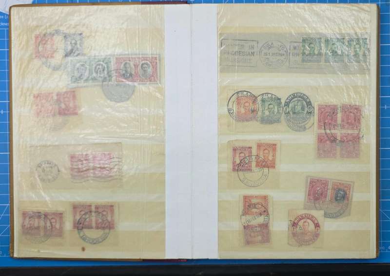 Stock Book: Old Medium 8/16 White Page with Used Rhodesia & Postmarks: Possible Finds!