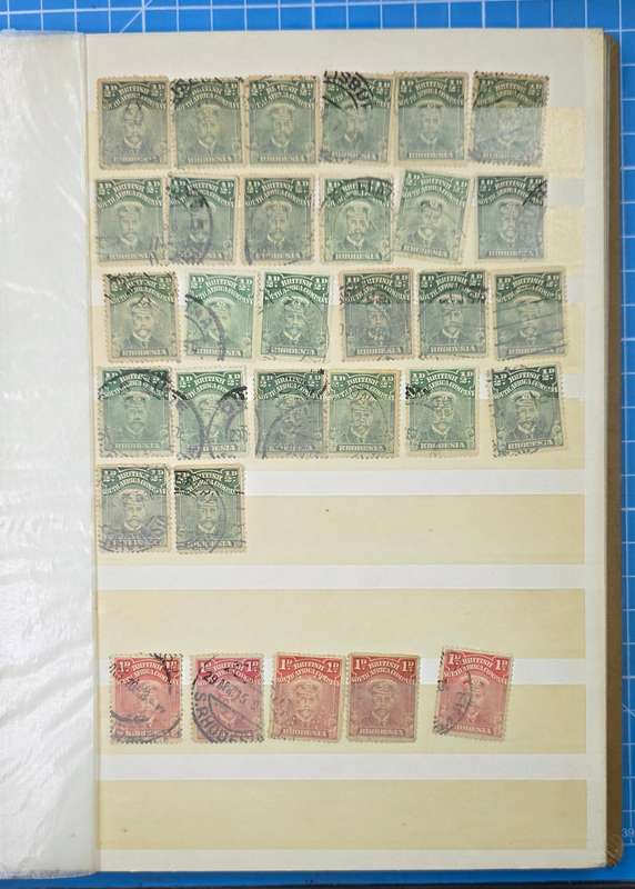 Stock Book: Old Medium 8/16 White Page with Used Rhodesia & Postmarks: Possible Finds!