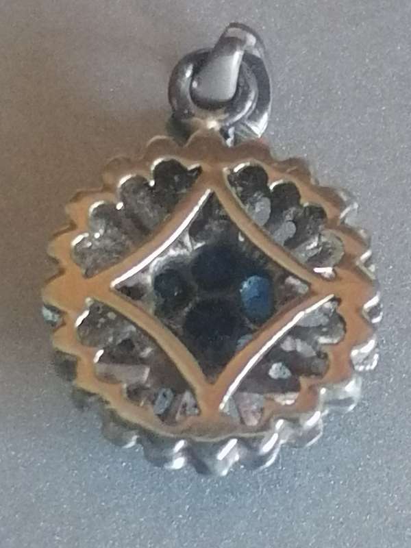 Vintage Sterling Silver blue sapphire pendant.