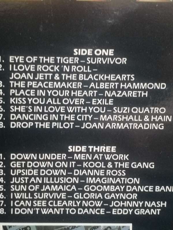 Pop Shop Gold '32 number one Hits '73-'83, vinyl's in very good condition.
