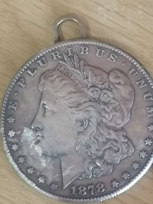 Very Rare collectors piece, 1878 Silver Morgan Dollar (turned into a pendant watch) 100% real.