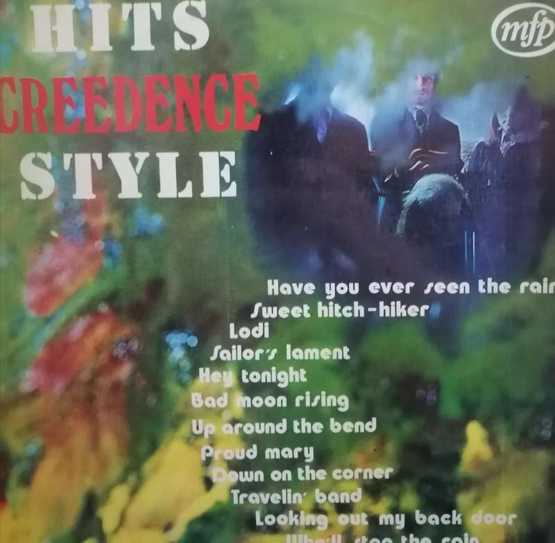 Hits Creedence Clearwater Revival style,  vinyl very good.