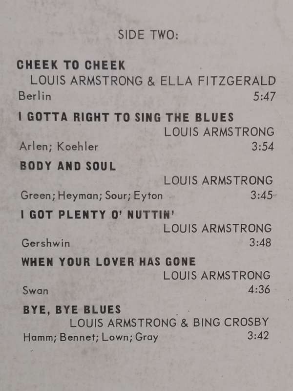 Louis Armstrong...a profile, vinyl very good & cover fair.