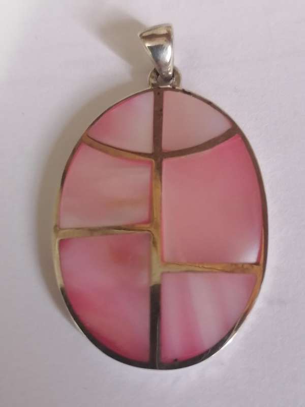 Beautiful sterling silver large pink shell pendant.