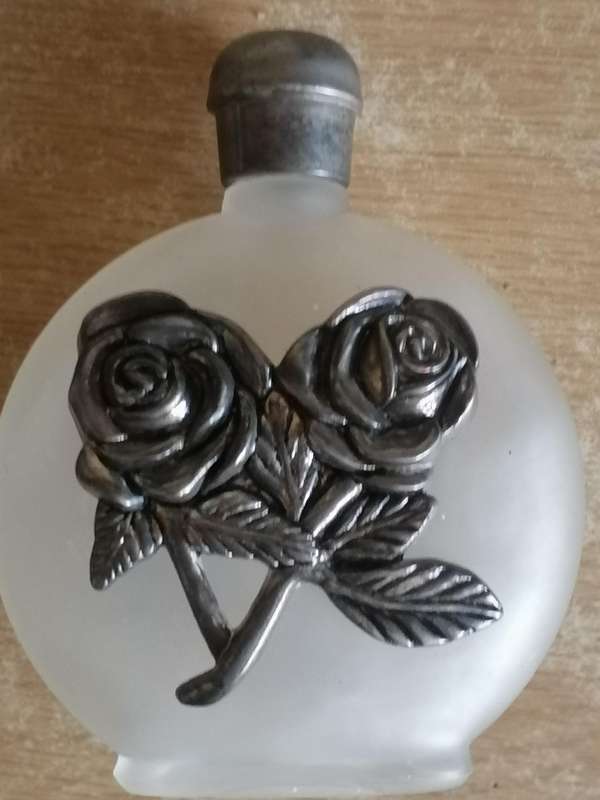 Very old Art Nouveau perfume bottle, decorated with a stunning pewter rose design.
