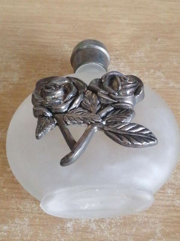Very old Art Nouveau perfume bottle, decorated with a stunning pewter rose design.