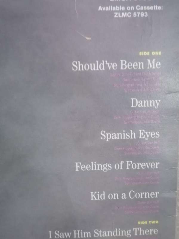 Tiffany, include, I think we're alone now ,vinyl very good.