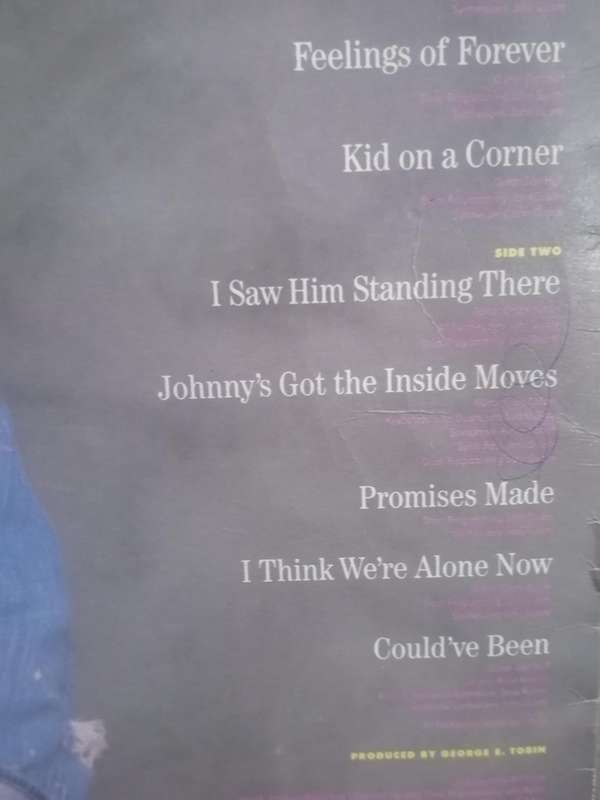Tiffany, include, I think we're alone now ,vinyl very good.