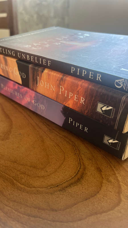 3 X John Piper books. Desiring God
