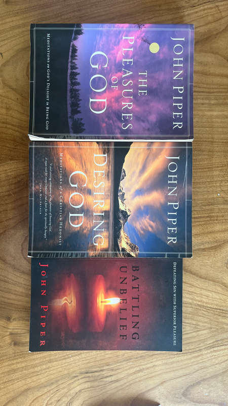 3 X John Piper books. Desiring God