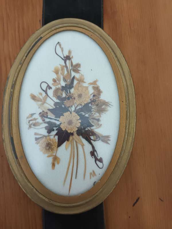 Vintage triptych wall hanging of small oval dried flower pictures