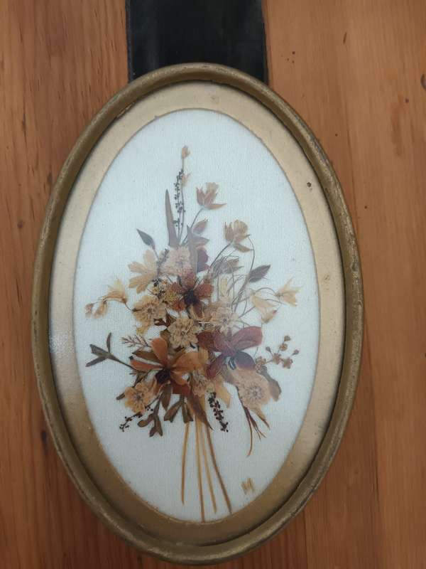 Vintage triptych wall hanging of small oval dried flower pictures
