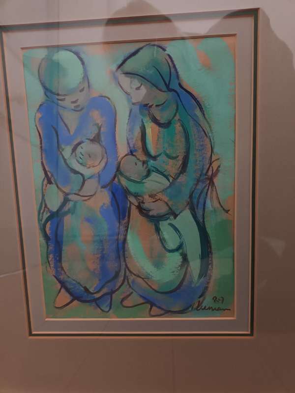 Niemann: Mixed media of two mothers nursing their children