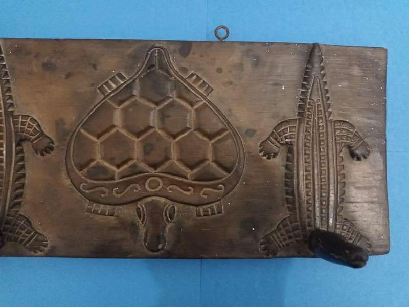 Vintage African carved wooden zoomorphic clothes hanger