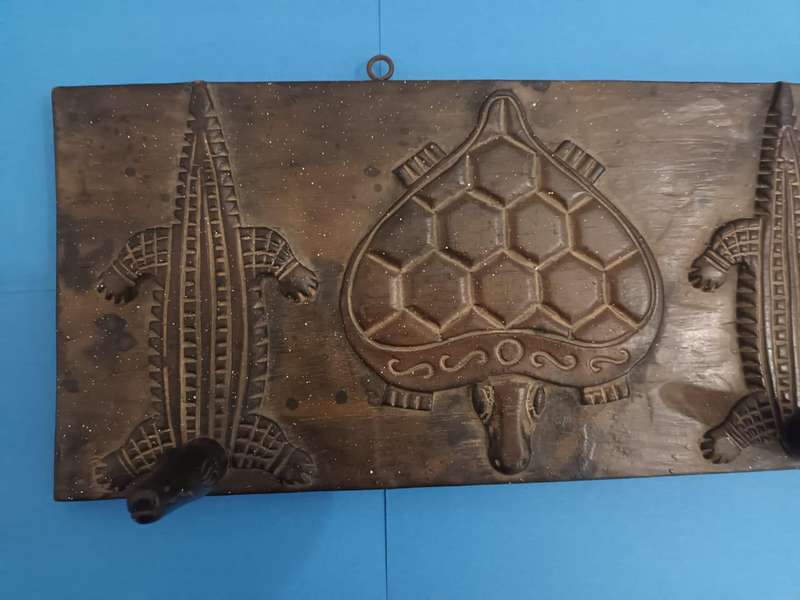 Vintage African carved wooden zoomorphic clothes hanger