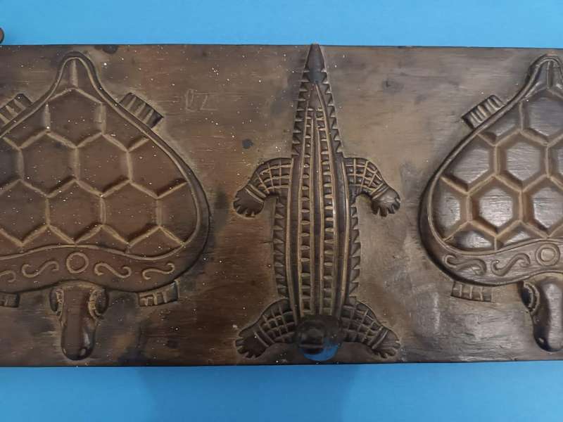 Vintage African carved wooden zoomorphic clothes hanger