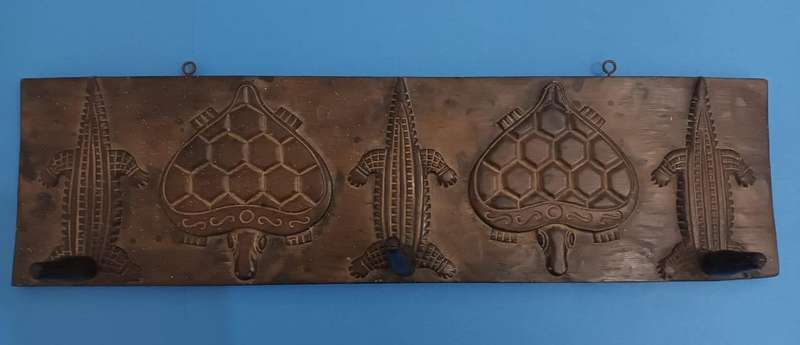 Vintage African carved wooden zoomorphic clothes hanger
