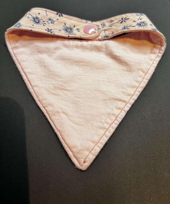 Baby bandana bib - newborn size (navy flowers on pink)