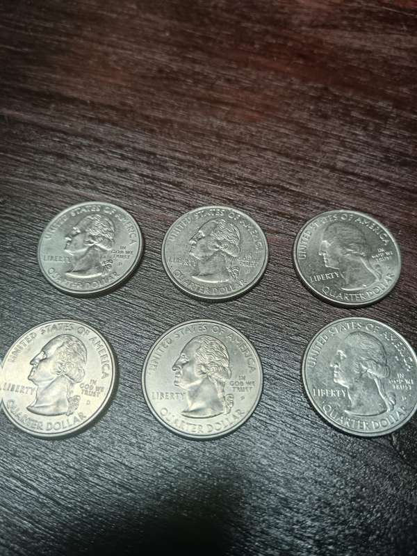 6x United States of Amrica 1/4 Dollar coins.