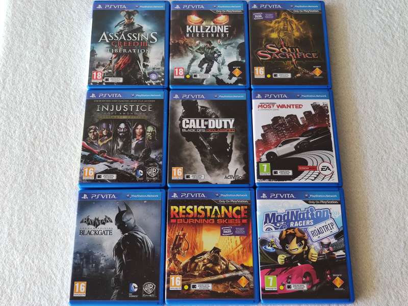 Playstation Vita Console + 9 Games + 8GB Memory Card (Model 1004 - Wifi Only)
