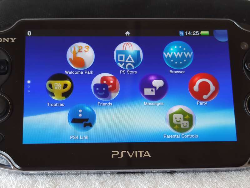 Playstation Vita Console + 9 Games + 8GB Memory Card (Model 1004 - Wifi Only)