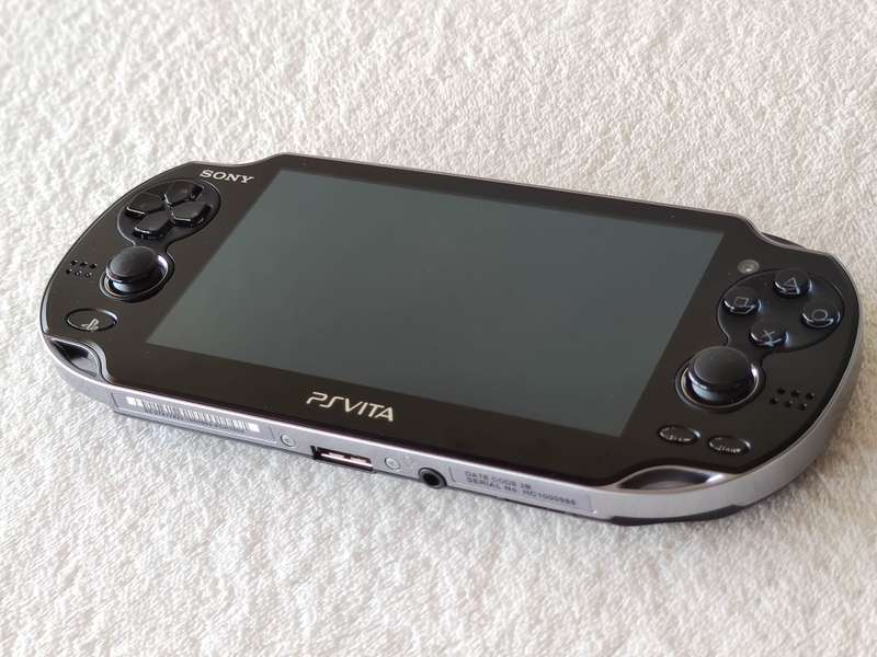 Playstation Vita Console + 9 Games + 8GB Memory Card (Model 1004 - Wifi Only)