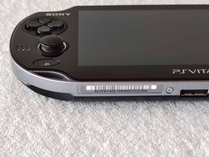 Playstation Vita Console + 9 Games + 8GB Memory Card (Model 1004 - Wifi Only)