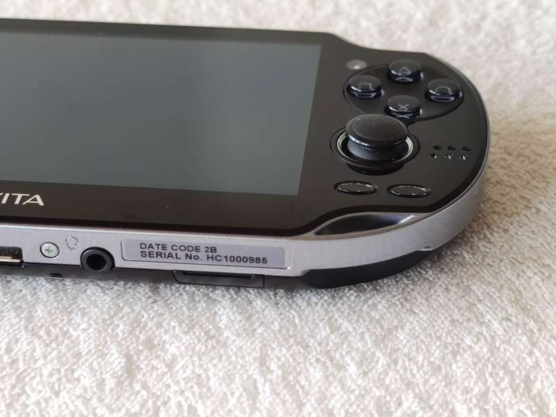 Playstation Vita Console + 9 Games + 8GB Memory Card (Model 1004 - Wifi Only)