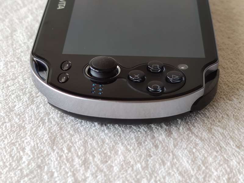 Playstation Vita Console + 9 Games + 8GB Memory Card (Model 1004 - Wifi Only)