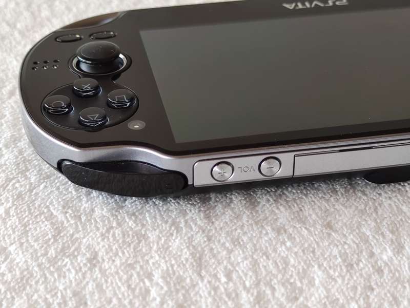 Playstation Vita Console + 9 Games + 8GB Memory Card (Model 1004 - Wifi Only)