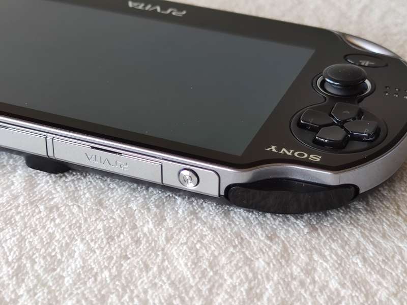 Playstation Vita Console + 9 Games + 8GB Memory Card (Model 1004 - Wifi Only)
