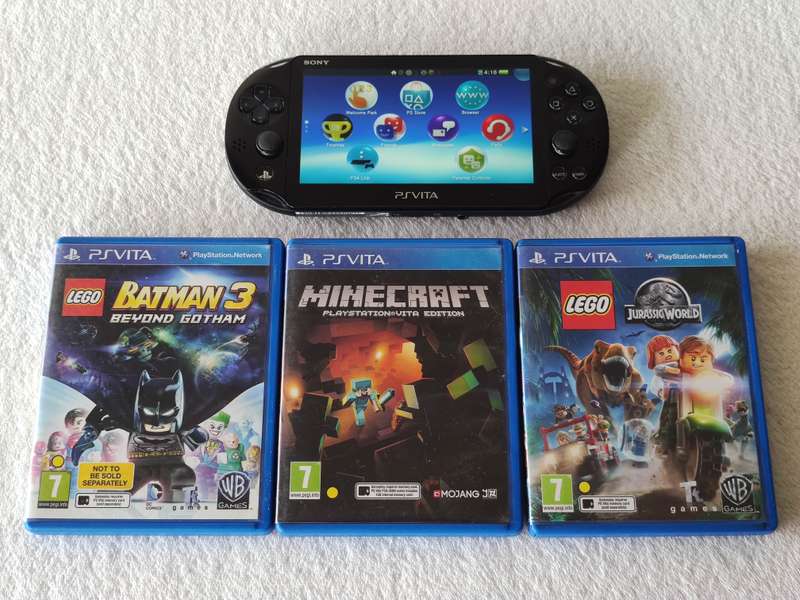 Playstation Vita Slim Console + 3 Games