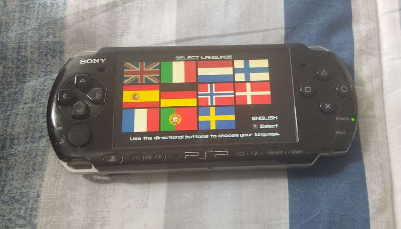PSP Collection (PSP Console + 14 Games + Carry Case + Charger)