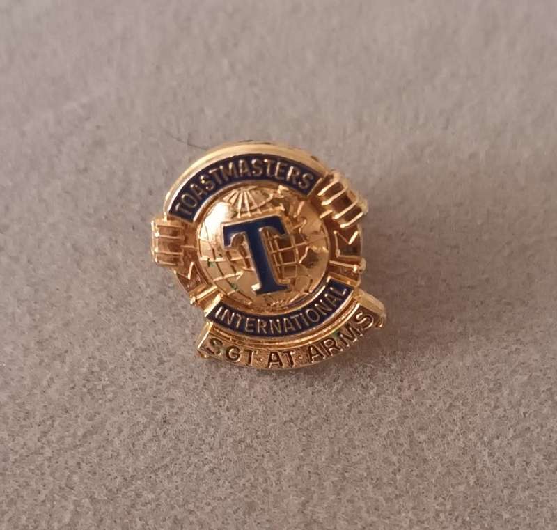 TOASTMASTERS INTERNATIONAL SERGEANT AT ARMS BADGE