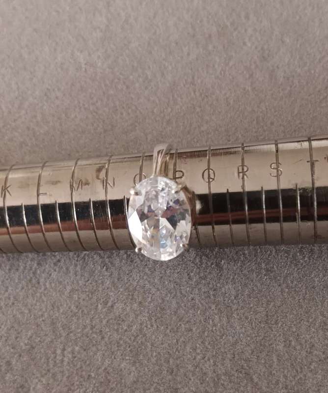 Stunning Sterling Silver Ring with Oval Cut Zirconia. Size O 1/2.