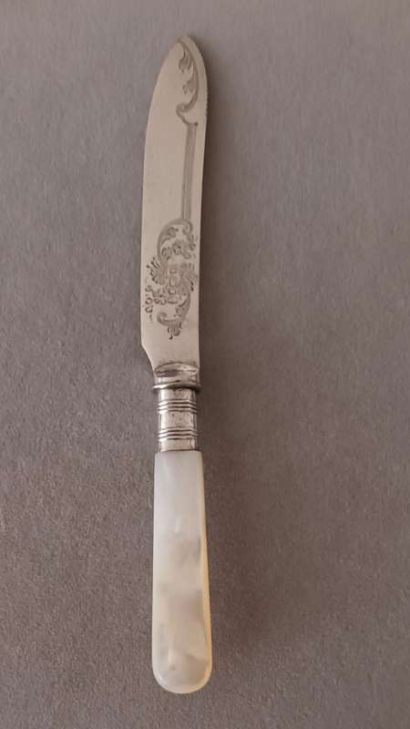 Exquisite Vintage Knife with Mother of Pearl Handle.