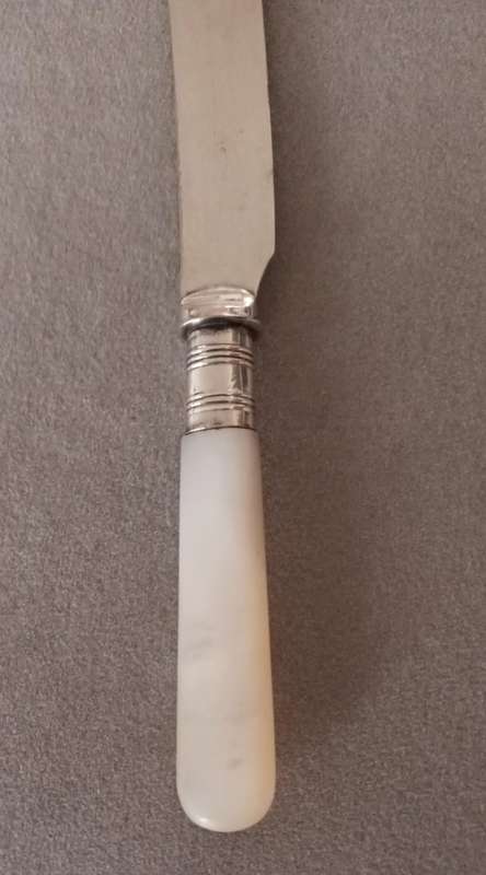 Exquisite Vintage Knife with Mother of Pearl Handle.
