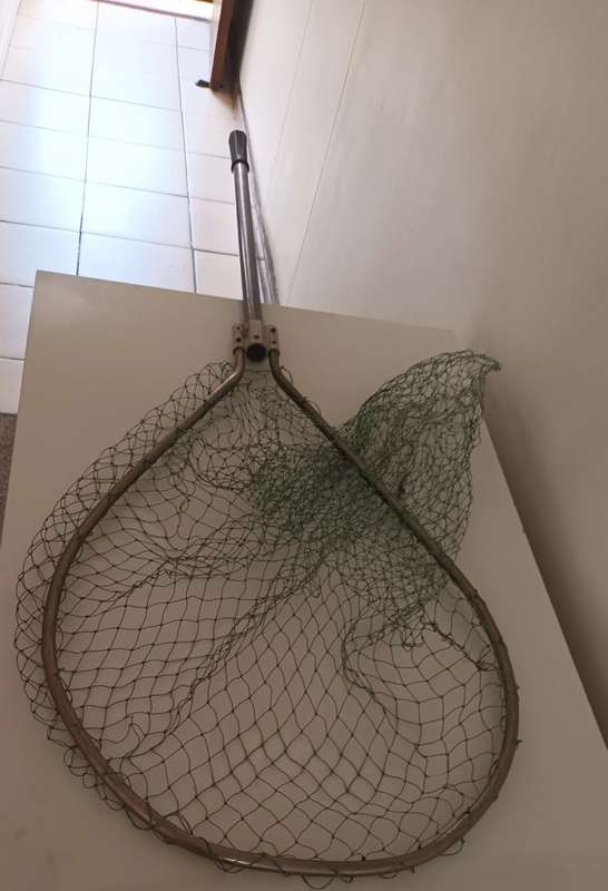 Fishing Landing net. Patched up. Still useable. Length 1.41m