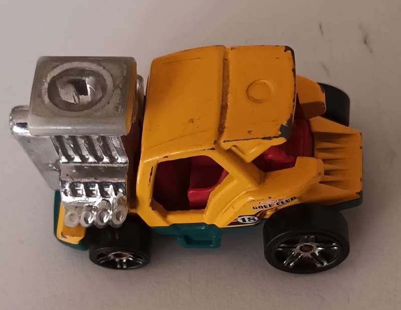 HOT WHEELS "Tee'd Off 2". 2014. MATTEL. Made in Malaysia.