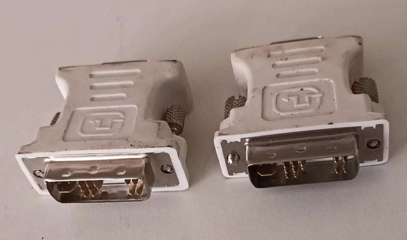 2x DVI-A (Analog) to VGA Adapters.