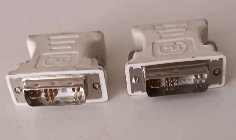 2x DVI-A (Analog) to VGA Adapters.