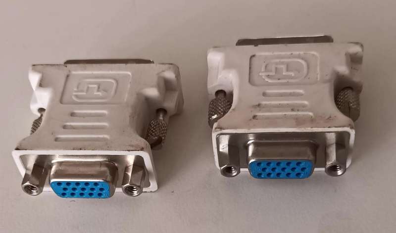 2x DVI-A (Analog) to VGA Adapters.
