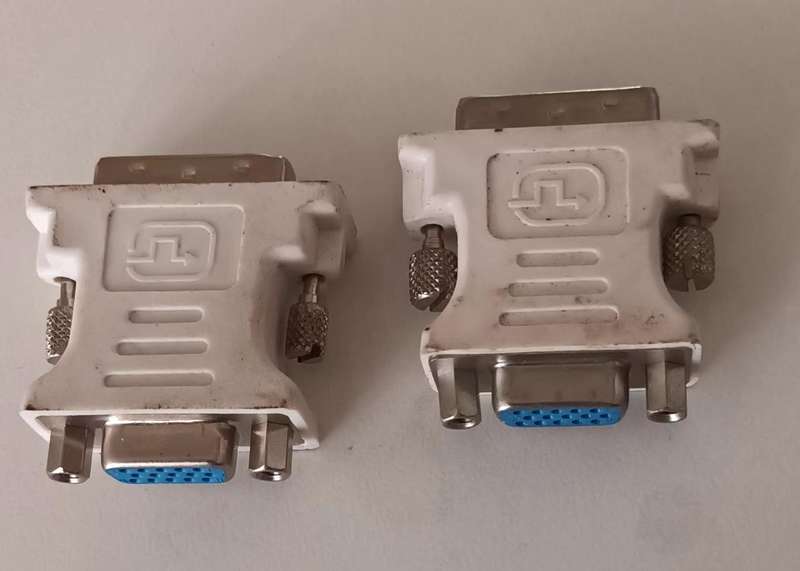 2x DVI-A (Analog) to VGA Adapters.
