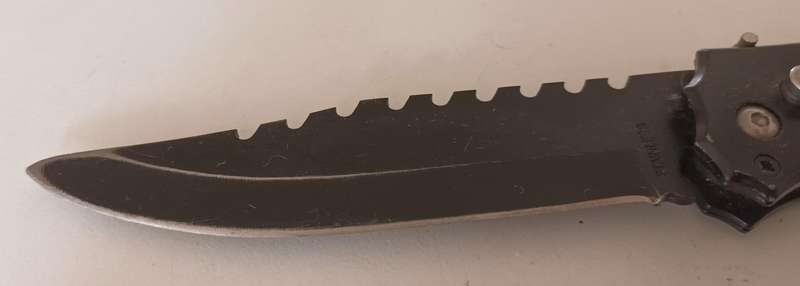 Flick Knife. 23.5cm. Blade 10.5cm.